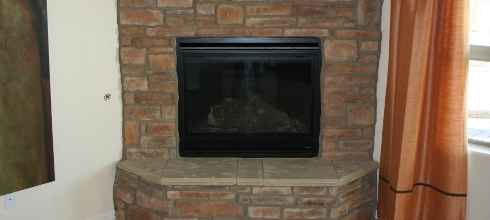 Fireplace | Precast Panels of Hearth and Mantle Contrasting with Brick