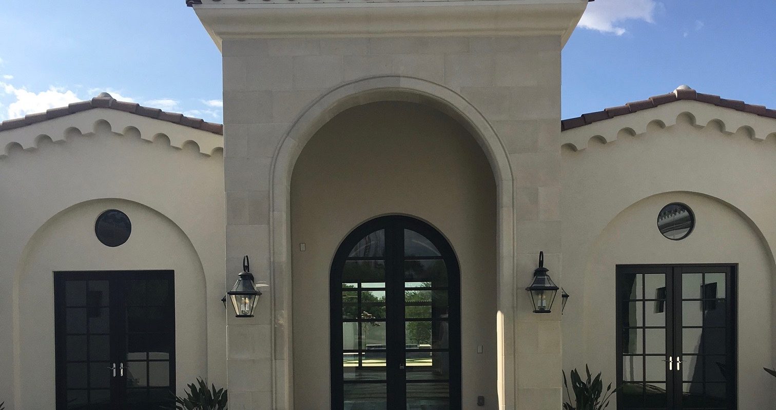 Matching Stone Panels on Front Face of Elevation, and also Surrounding Entry Way Trim Matching Stone Panels on Front Face of Elevation, and also Surrounding Entry Way Trim