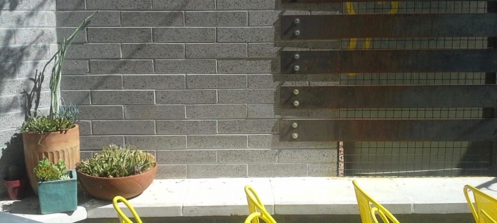 Exterior hardscape design - Fireplace Hearth in Restaurant Entertainment Area Outside Joyride Taco Place Exterior Hardscape Design | Fireplace Hearth in Restaurant Entertainment Area Outside Joyride Taco Place
