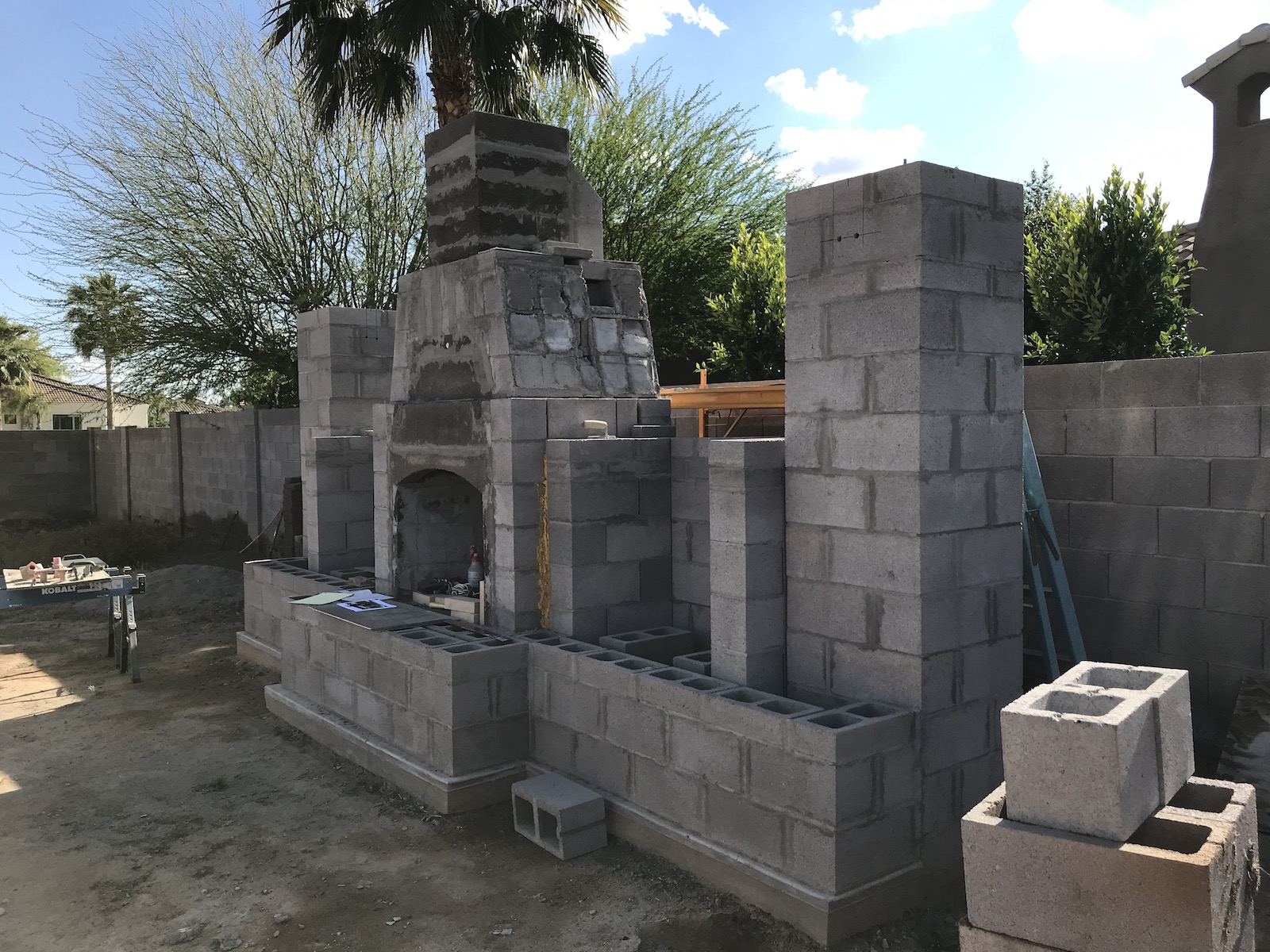 backyard fireplace - before